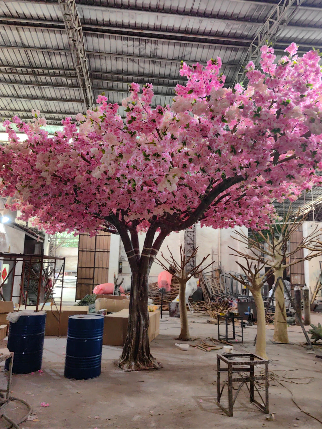 Faux cherry blossom tree 16ft tall, blossom spread across a very wide canopy