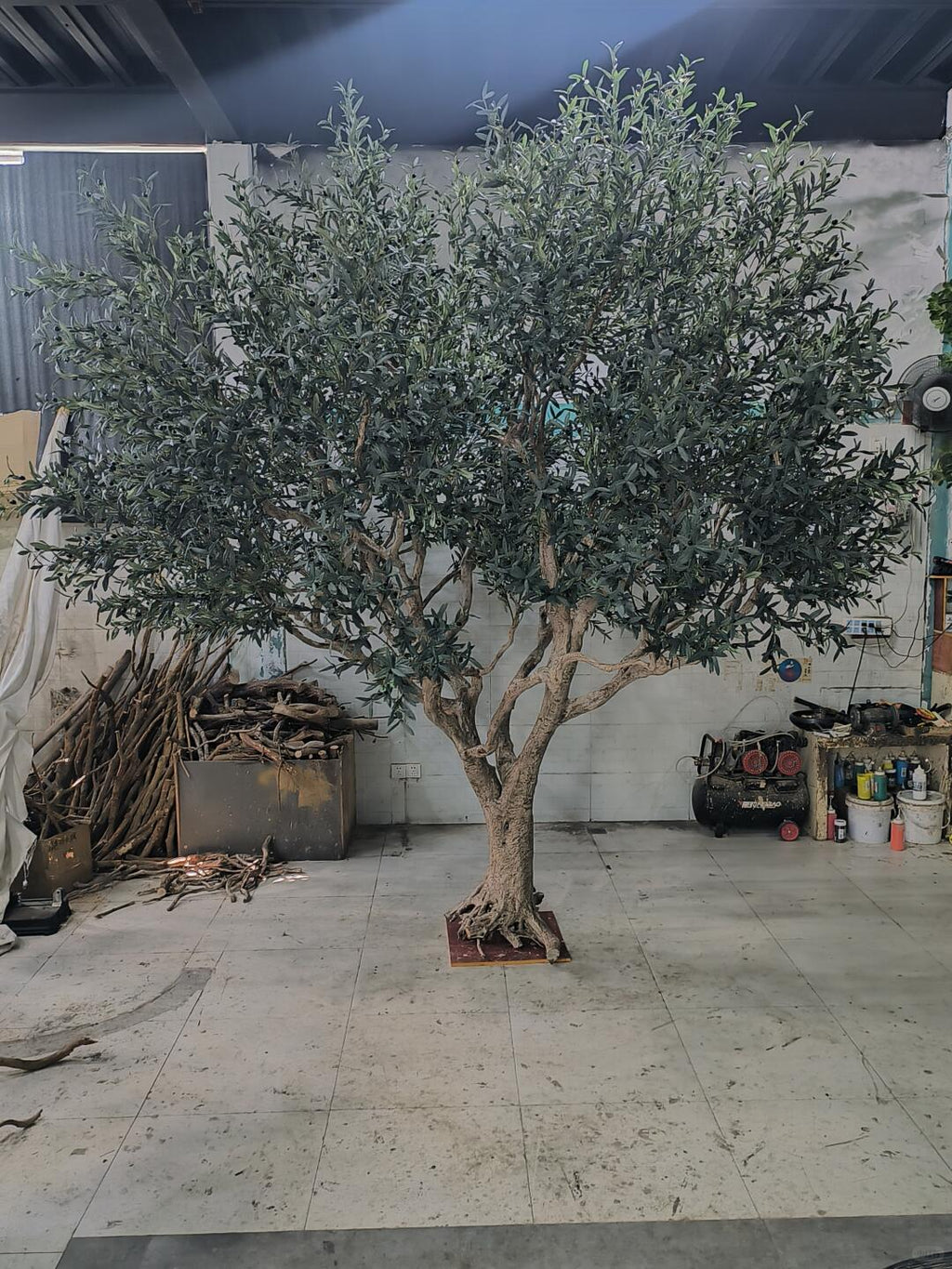 Custom-made artificial olive tree 10ft tall, silver-green foliage on a broad crown