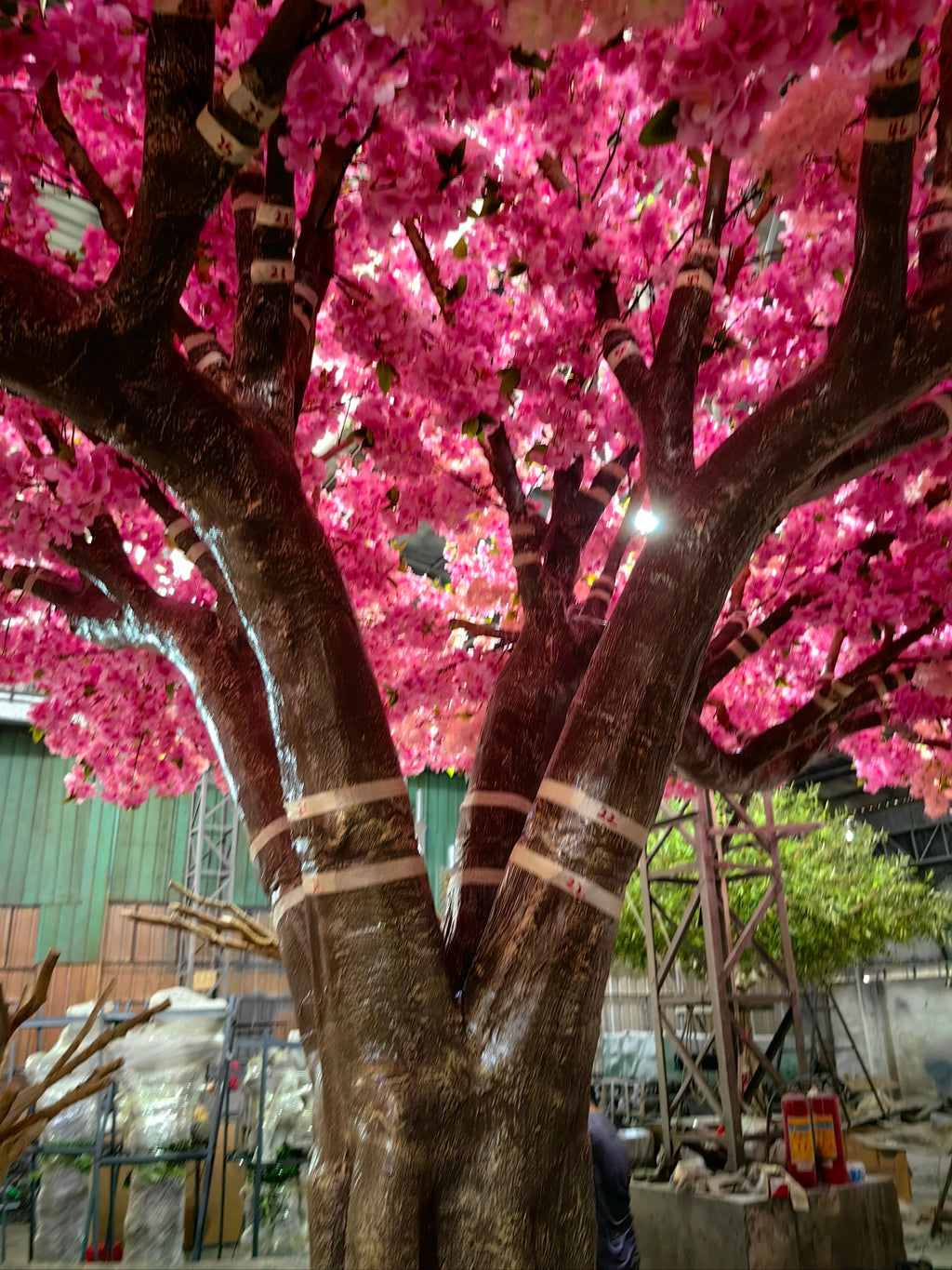 The 16ft blossom tree filling an indoor atrium high above the floor below