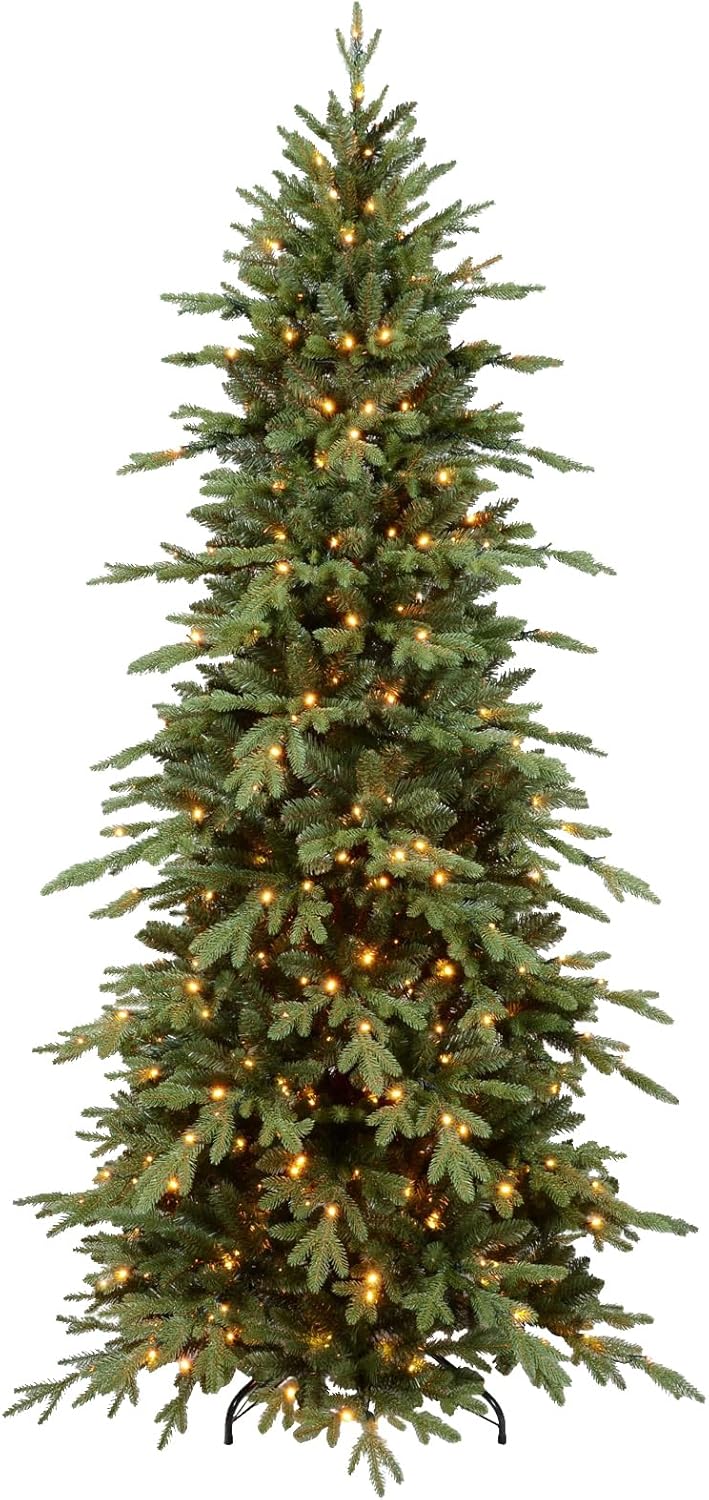 Pre-lit artificial Christmas tree 7.5ft tall, warm white lights through the branches
