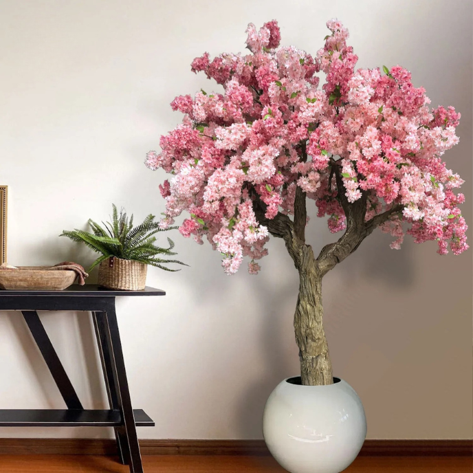 The sculpted bonsai-style trunk of the 6.6ft artificial cherry blossom tree