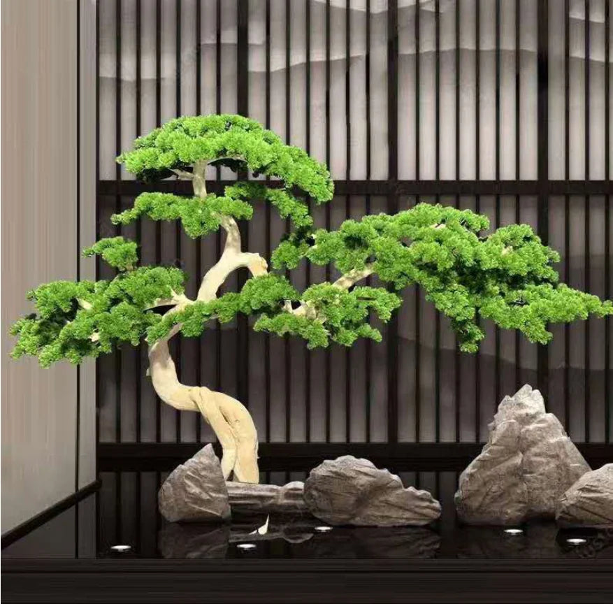 Base and pot of the artificial pine bonsai, finished with moss and gravel