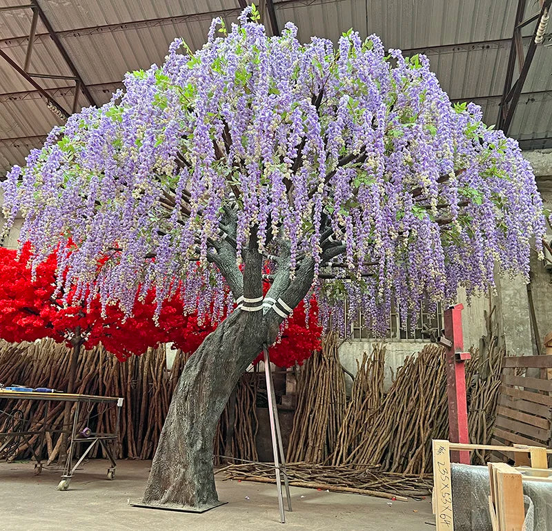 Close-up of the purple wisteria flowers hanging in long trailing strands