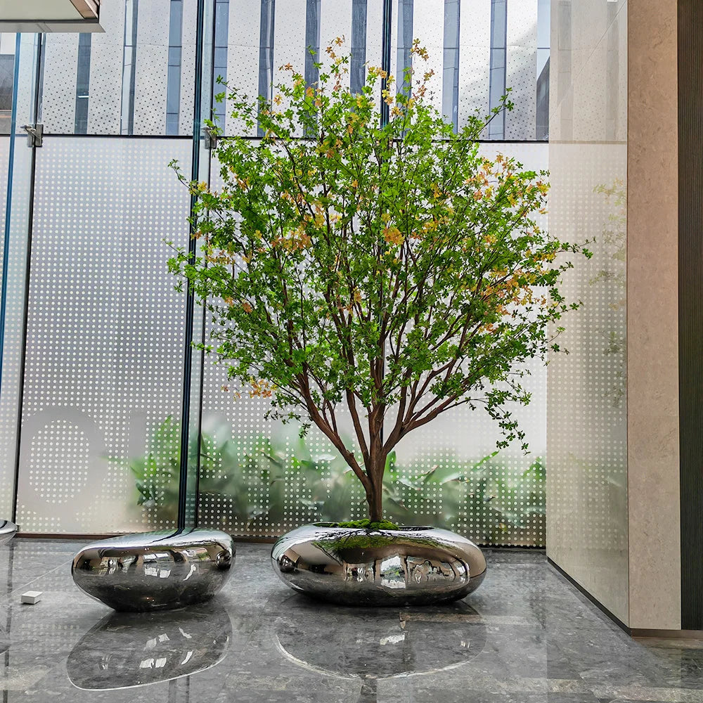 The decorative tree used as a statement piece at a large indoor event
