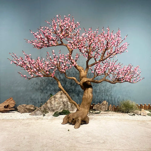 Large artificial cherry blossom tree, realistic blossom massed on bare branches