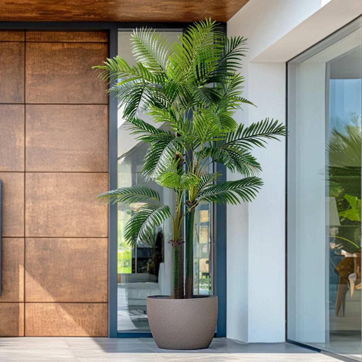 Textured trunk detail on the 9ft artificial palm, moulded to look like real bark