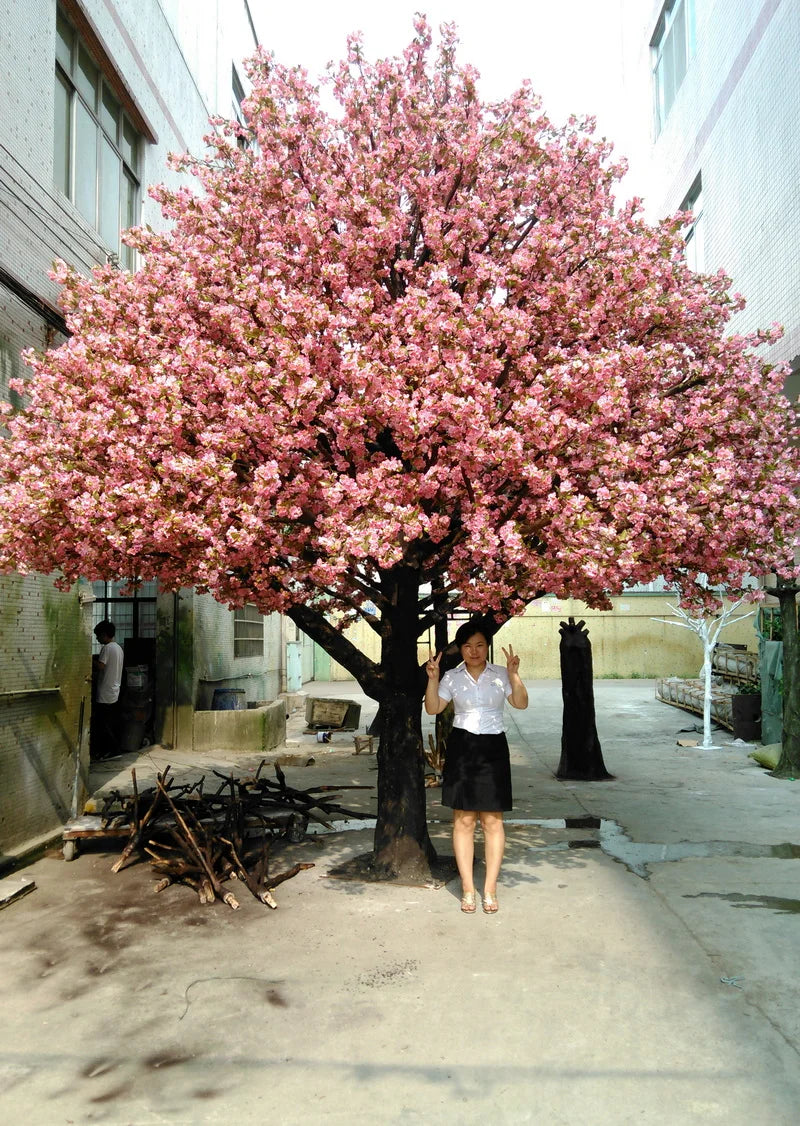 The natural trunk of the 5m blossom tree with its bark grain visible