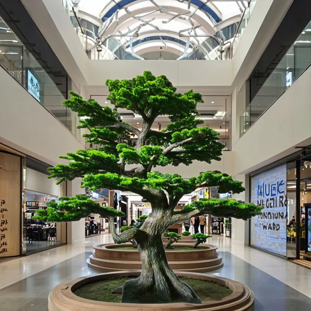 The bonsai in profile, its branches stepping well out from the main trunk