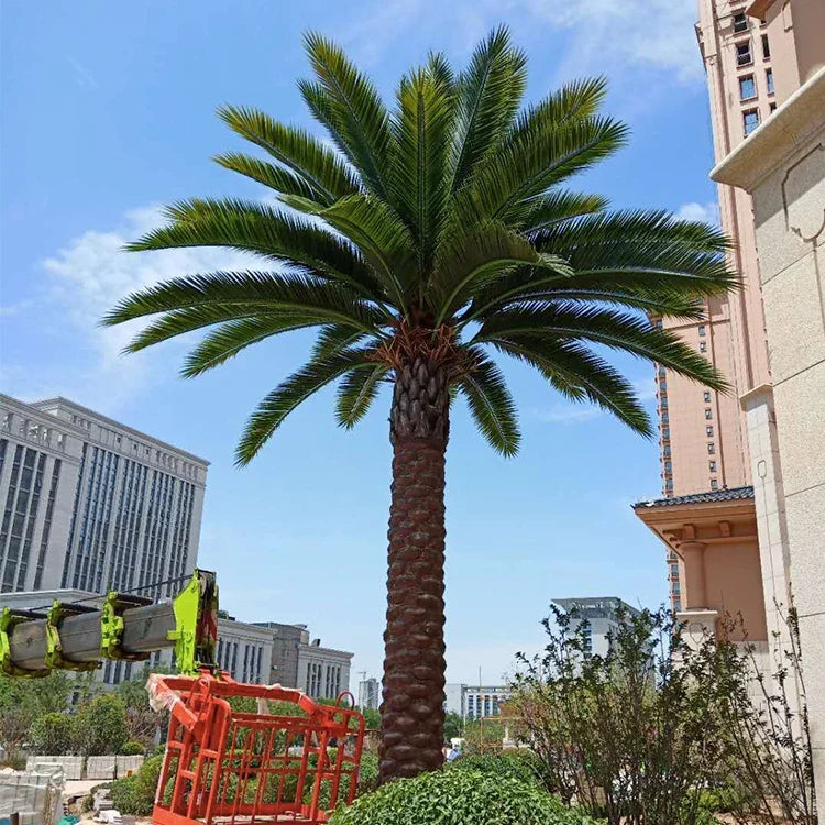Artificial date palm built for outdoor use, fronds radiating from a fibrous trunk