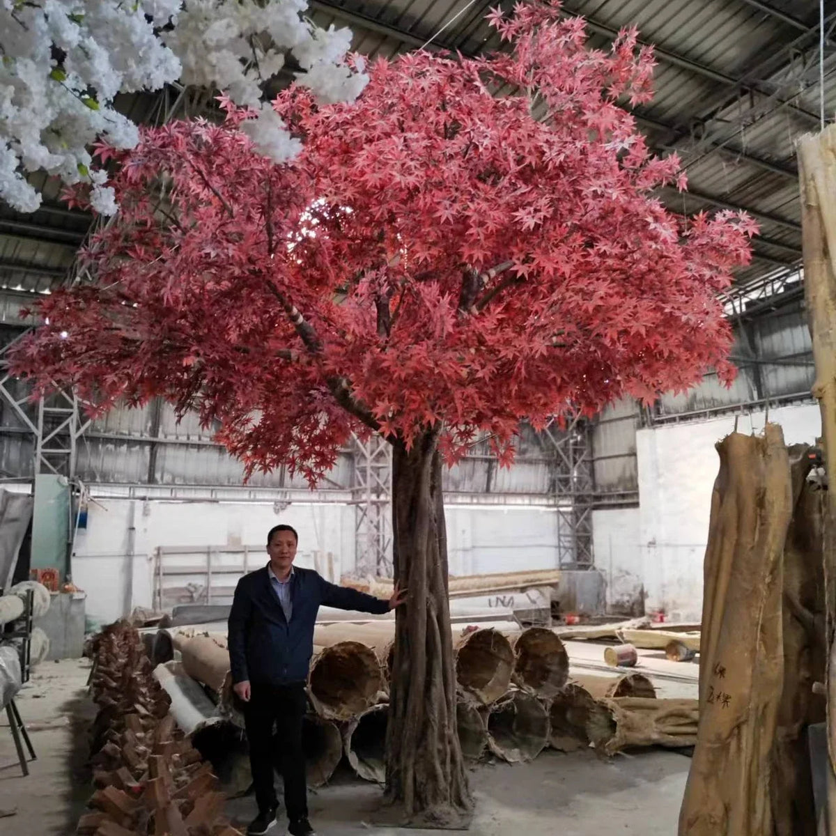 Artificial maple tree 17ft tall, foliage spread across a very wide custom canopy
