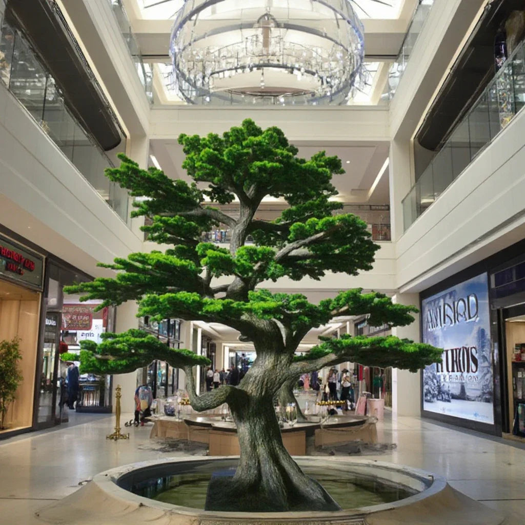 The 11.5ft pine bonsai standing in a lobby as a large indoor green feature