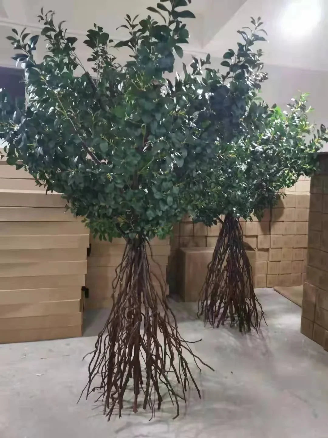 Close-up of the plastic mangrove leaves clustered on the branch tips