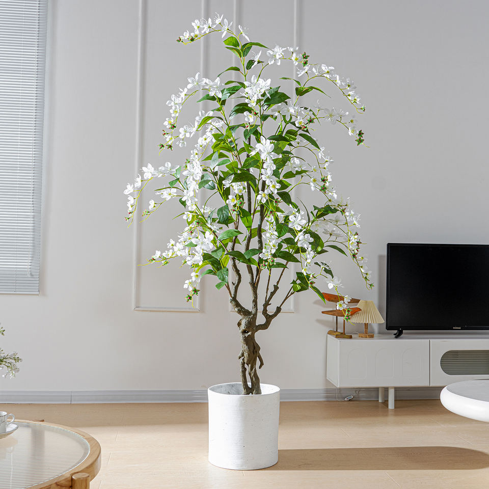 The pink flowering version of the draped jasmine tree shown from top to base