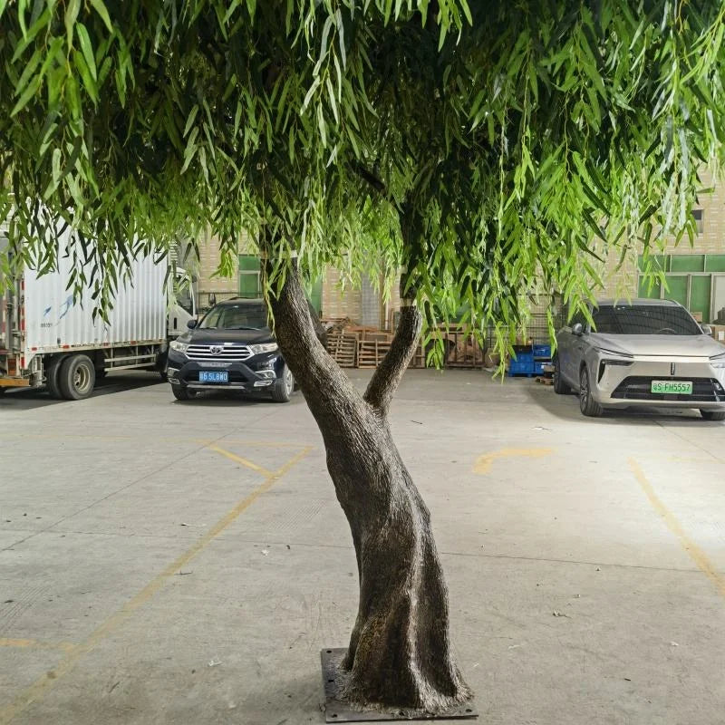 The 13ft weeping willow used as a garden feature standing beside a patio