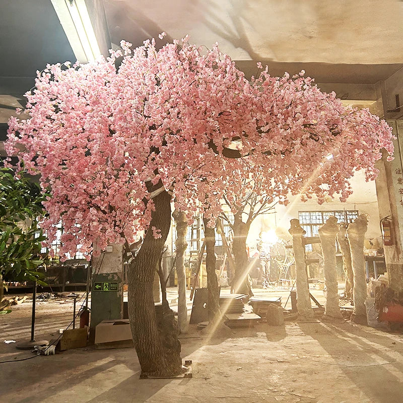 The 10ft sakura set behind a wedding ceremony aisle as a floral backdrop