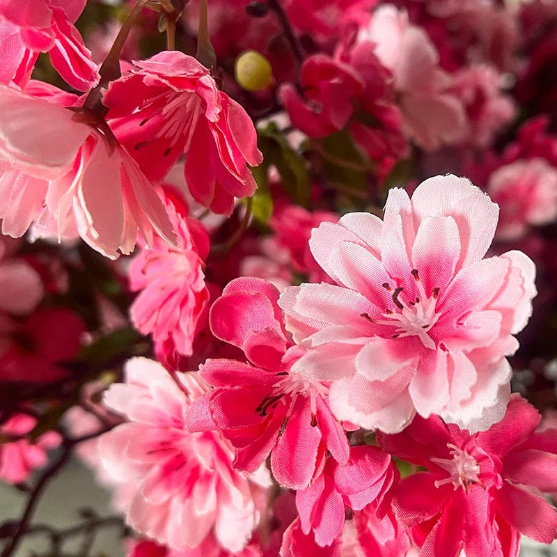 The branch frame of the custom-sized blossom tree beneath the flowers