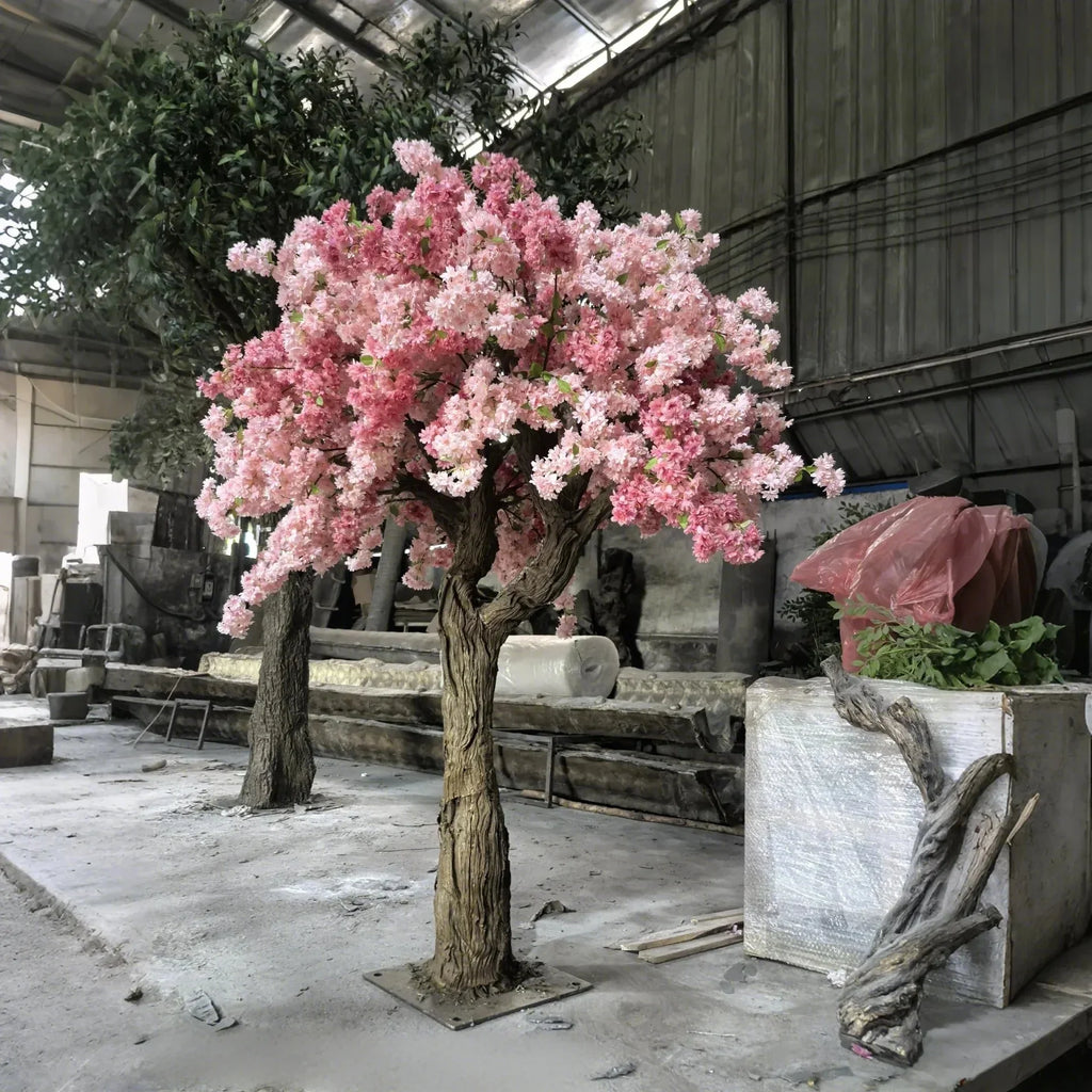 The 5ft blossom tree used as an indoor display beside a plain pale wall