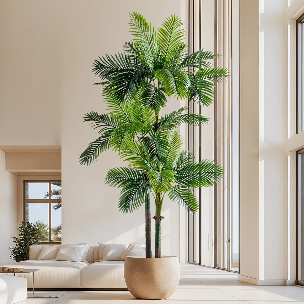 The 9ft faux palm standing indoors beside a window in a bright living space