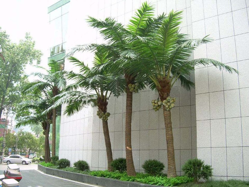 The ringed trunk of the artificial coconut palm seen looking up from ground level