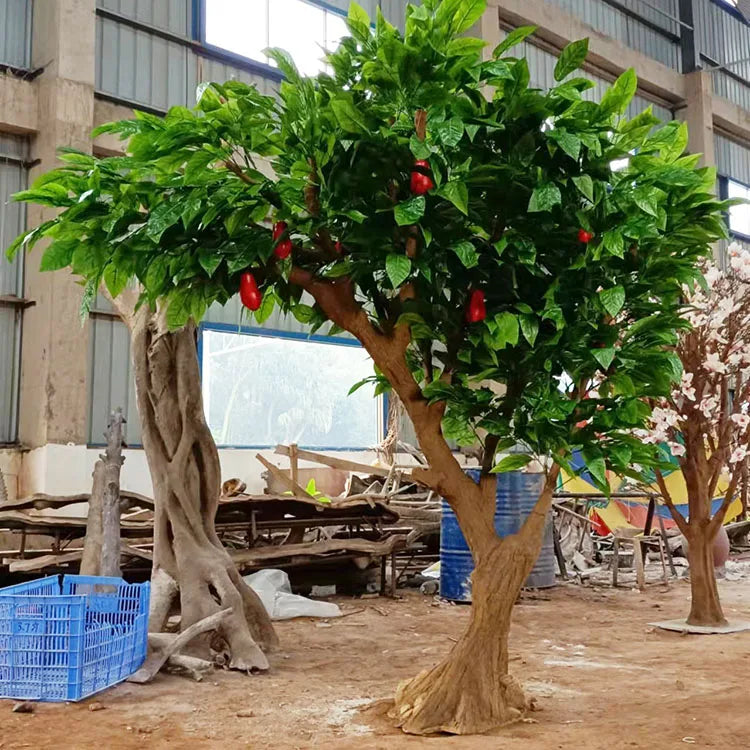 The trunk of the 2.5m cocoa tree, textured with fine and even bark grain