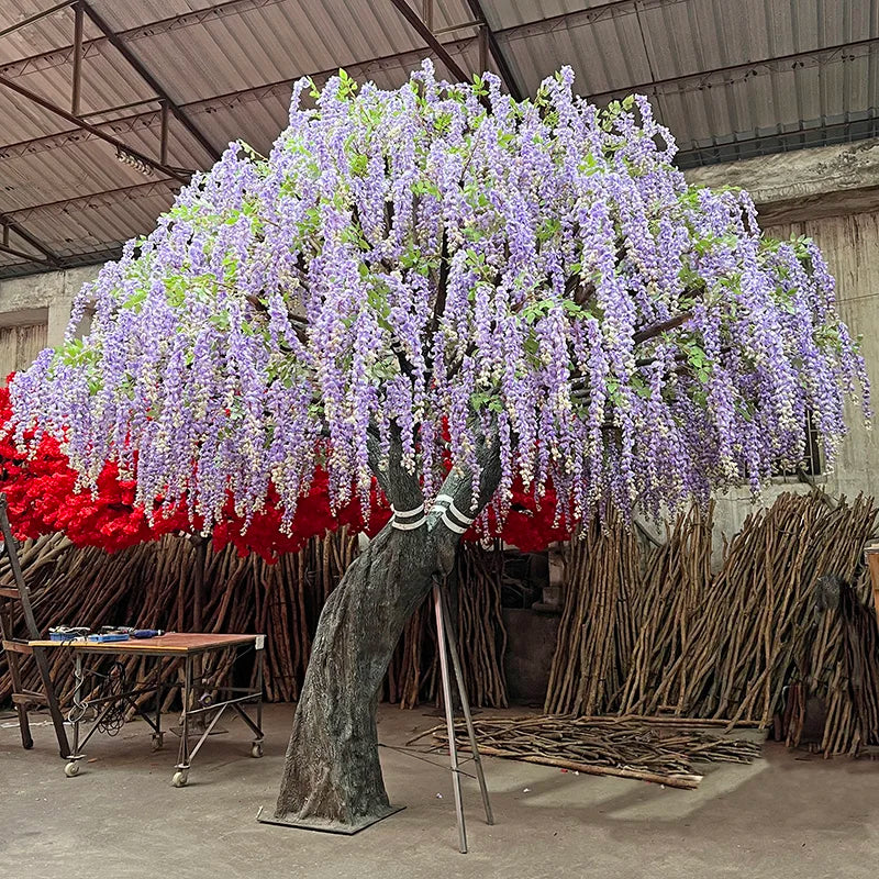 Artificial wisteria tree in purple bloom, flowering racemes weeping from the branches