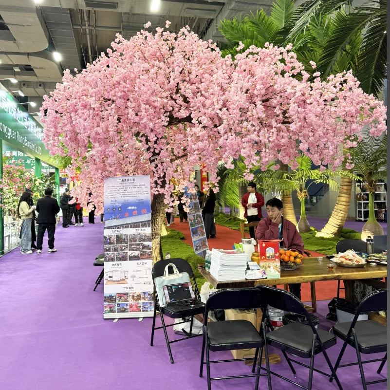 The trunk and branch frame of the 10ft sakura tree beneath the blossom