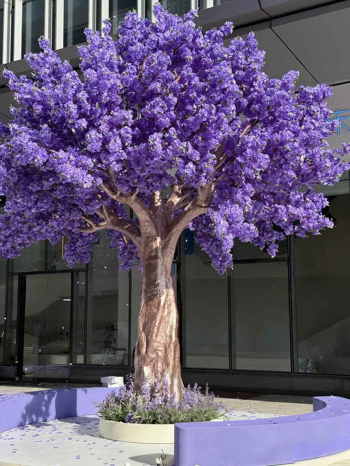 The blossom tree set up as a centrepiece over a wedding table arrangement