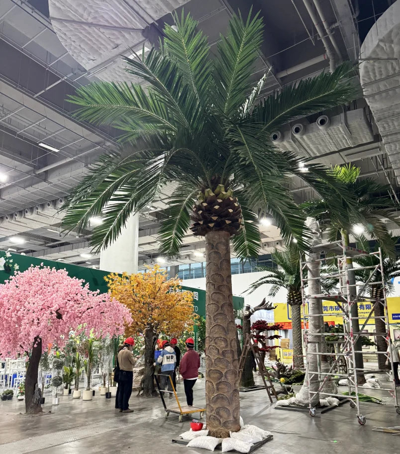 The 10m date palm rising through an indoor atrium above the upper walkways