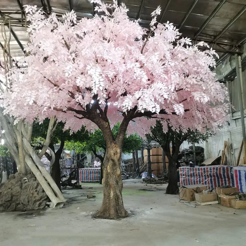 Close-up of the silk sakura blossoms clustered along the fine branch tips