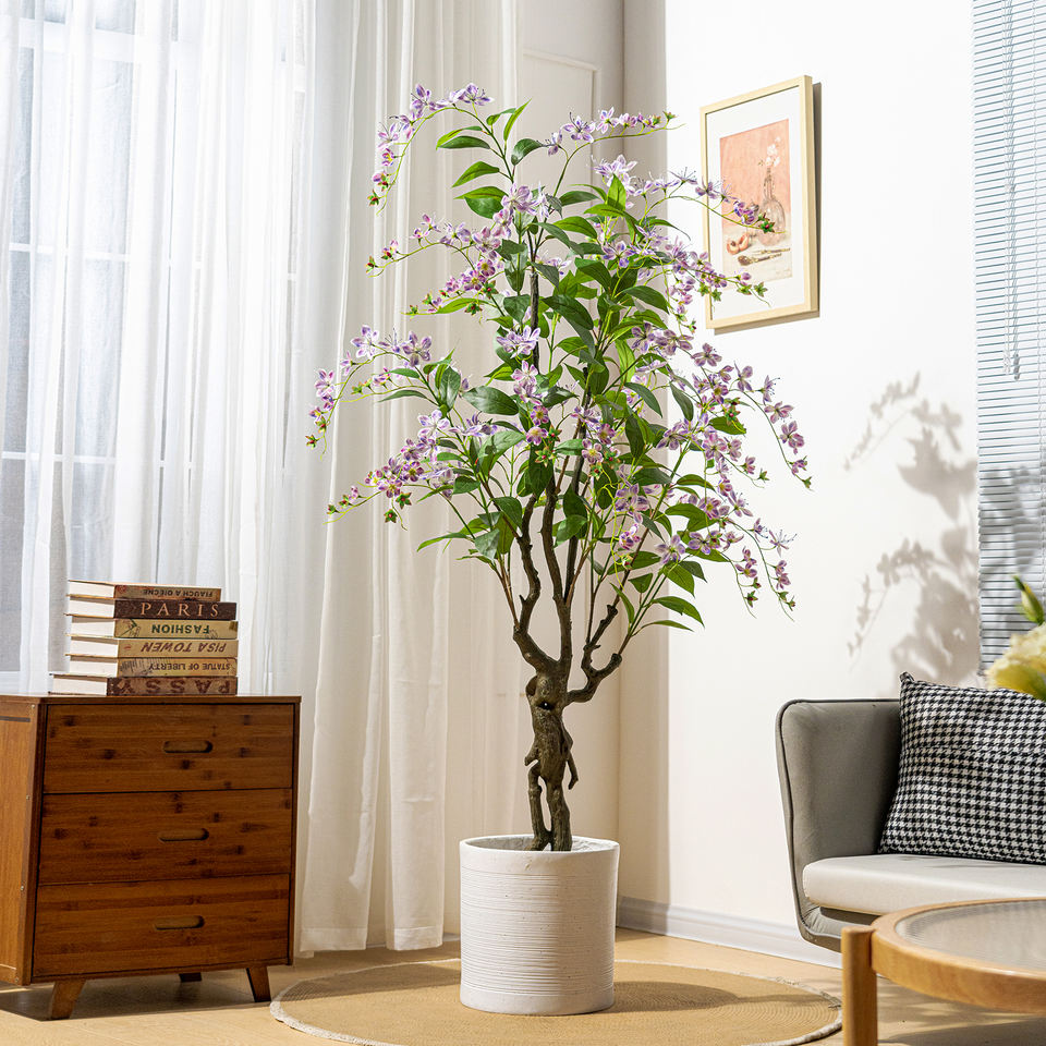 The jasmine tree in its white flowering version, styled in a bright hotel interior