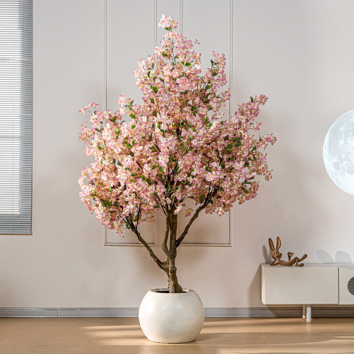 The trunk and branch frame of the 7.22ft blossom tree beneath the flowers