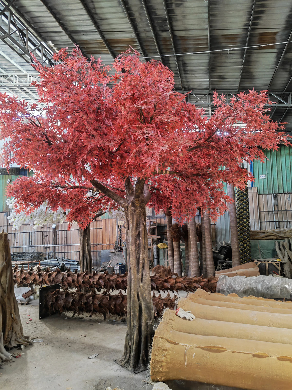 The 17ft maple tree set up as a centrepiece above a wedding banquet floor