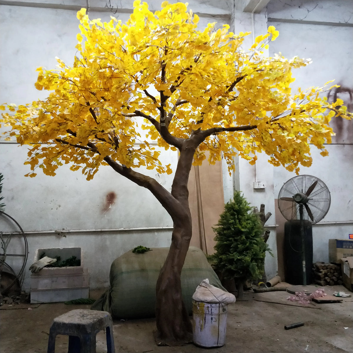 Artificial ginkgo tree on a natural wood trunk, fan leaves across an open canopy