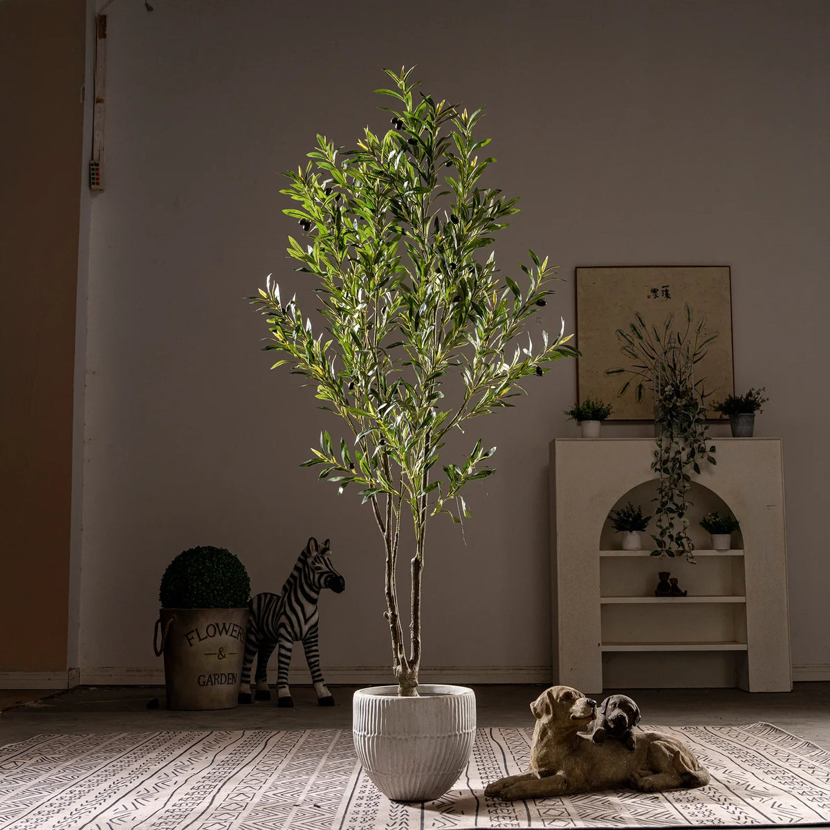 The moulded trunk of the 210cm olive tree, textured with gnarled bark