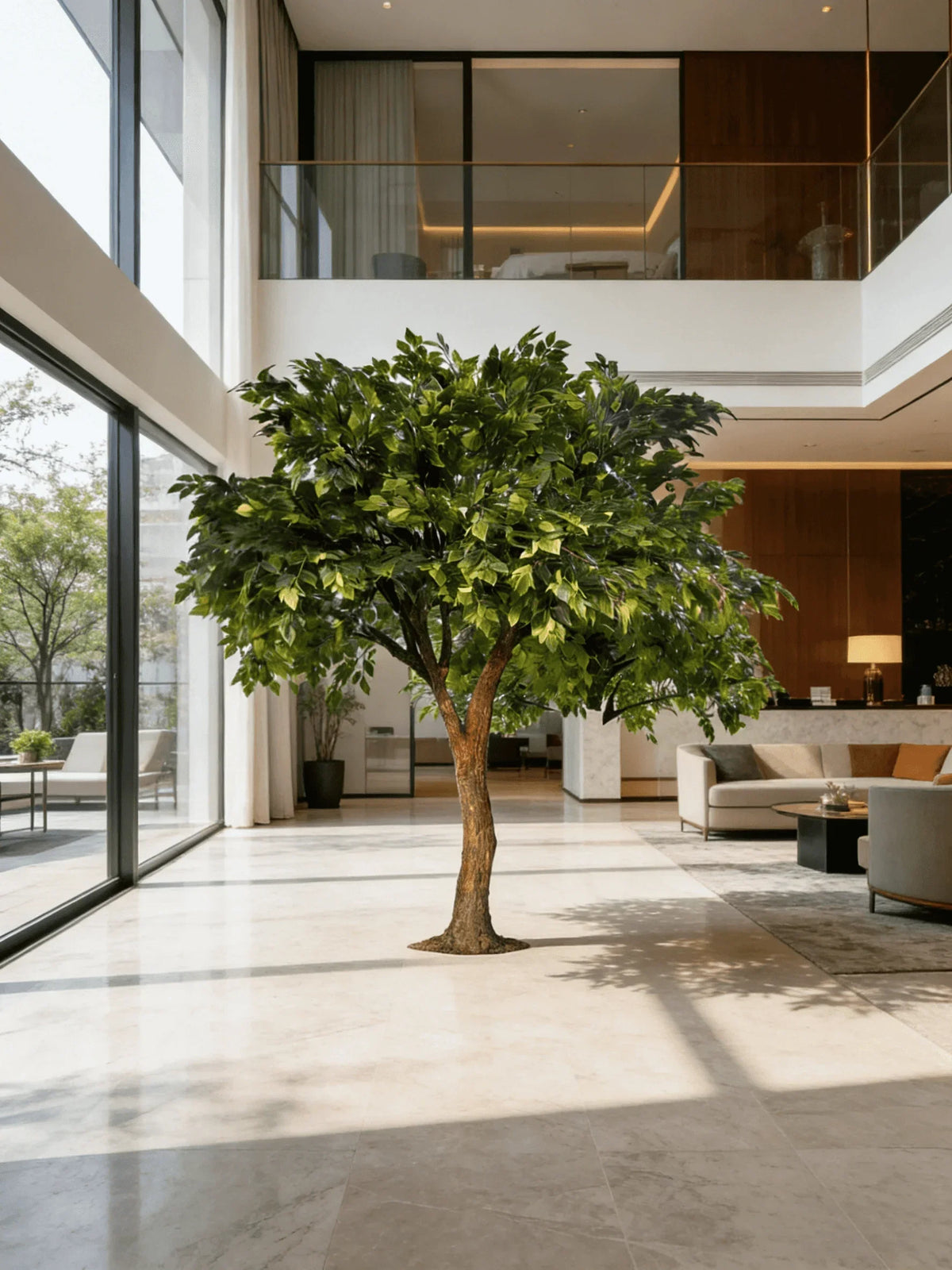The banyan tree filling a mall atrium, canopy reaching over the walkway