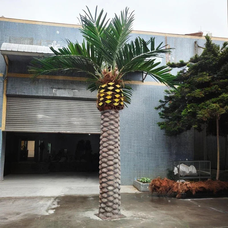 Base of the 10m artificial date palm where the trunk meets the ground
