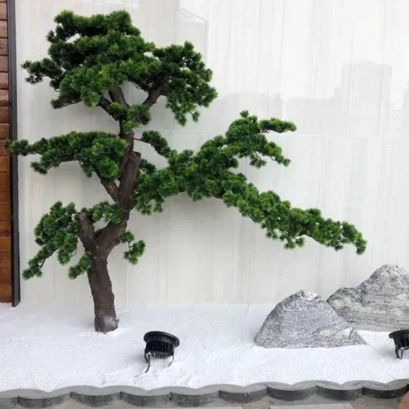 Pot and base of the 6ft artificial pine bonsai, topped with moss and stone