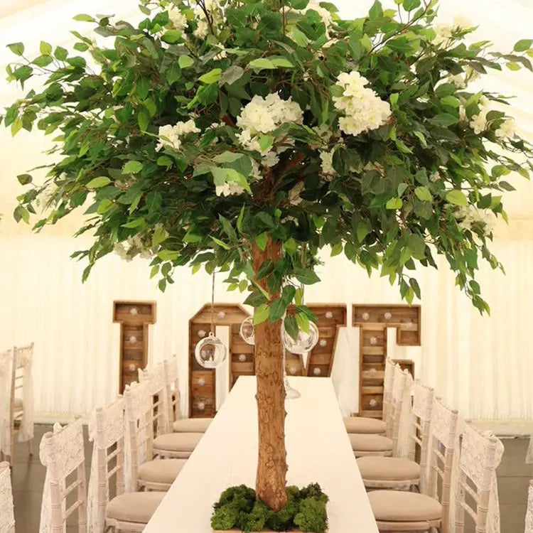 The 4ft birch tree used as a centrepiece on a dressed wedding table