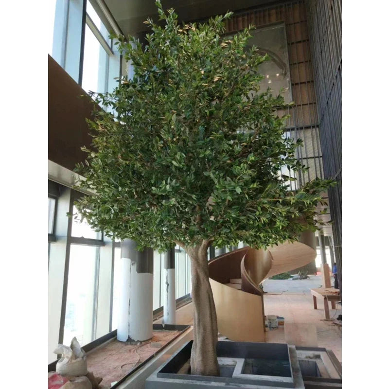 Artificial banyan tree shaped to order, dense ficus foliage on a spreading crown