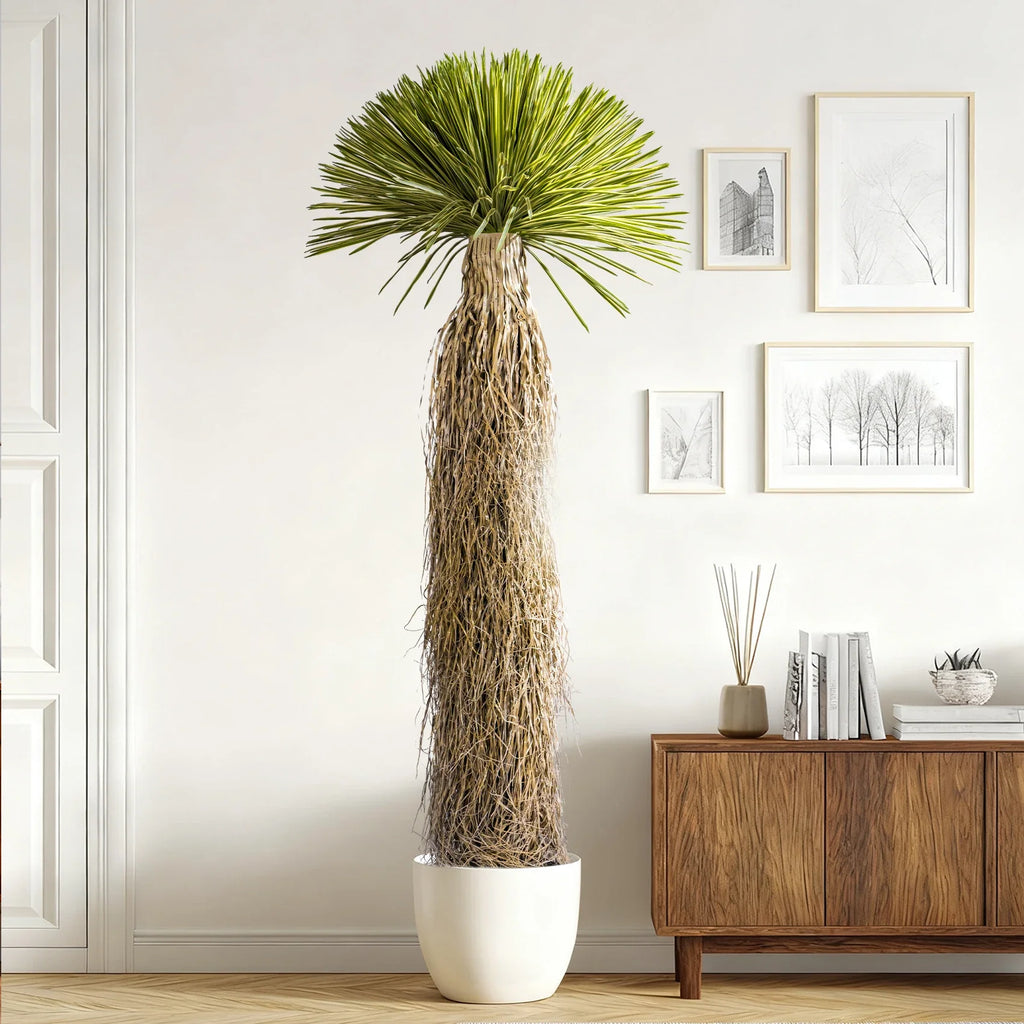 A leaf flexed by hand to show the softness of the natural-touch finish