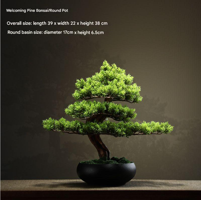 Artificial welcome pine 28in tall, potted, with branches trained out to one side