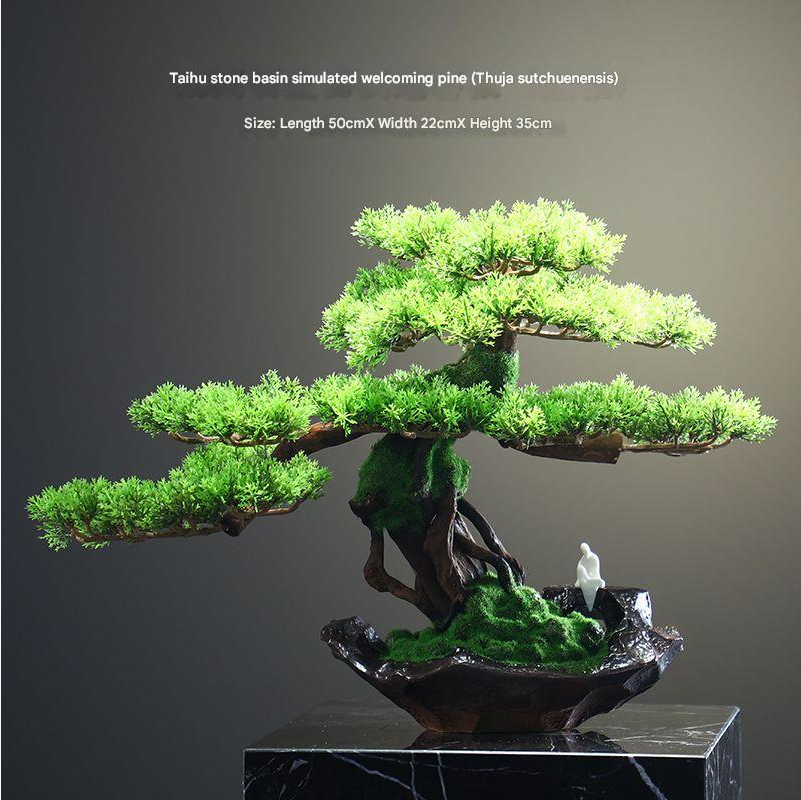 Pot and base of the 28in artificial welcome pine, topped with moss and stone
