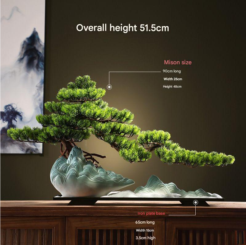 The moss and stone finish across the potting surface of the bonsai