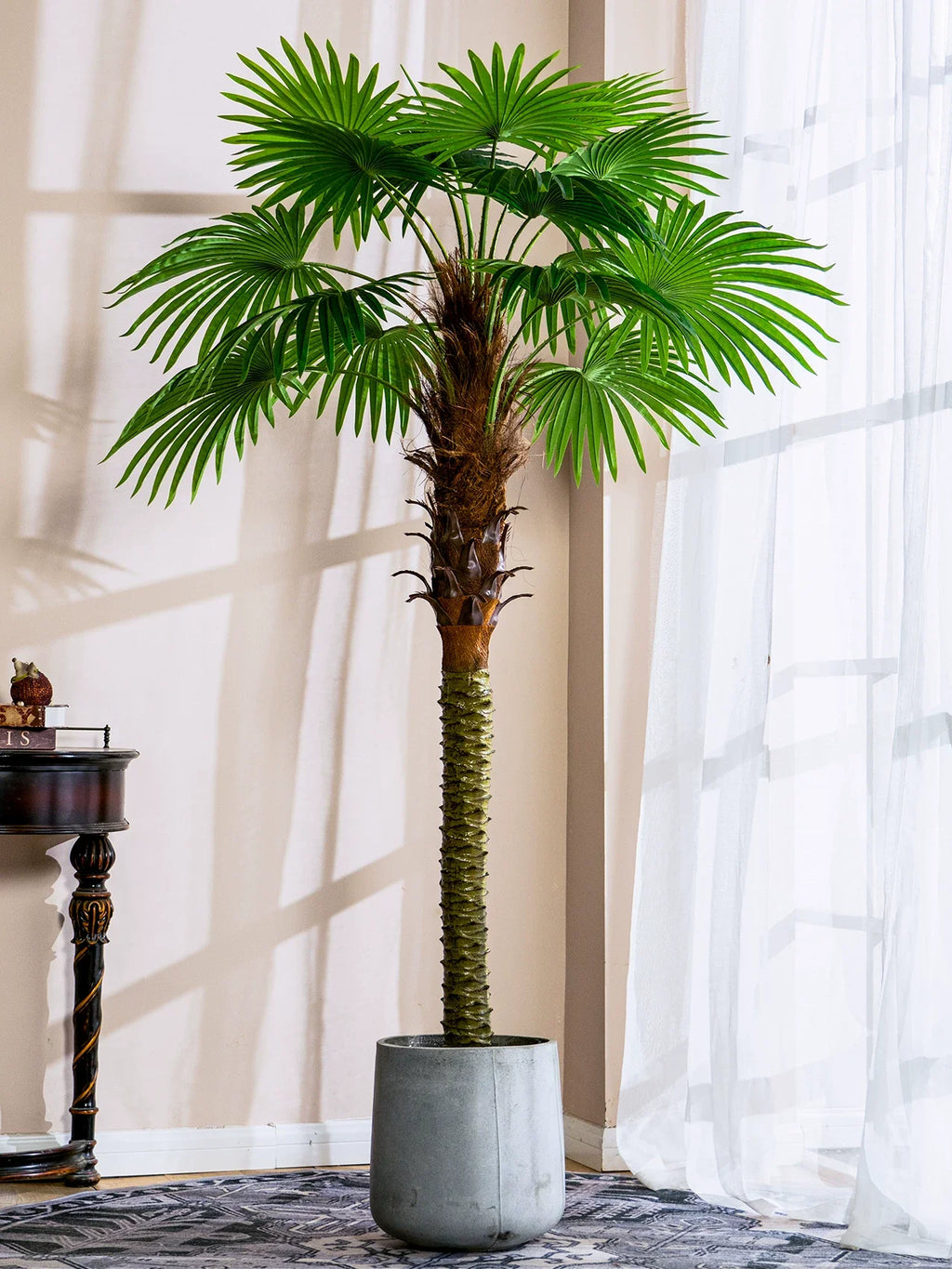 Base and pot of the artificial fan palm, sized to sit inside a decorative planter