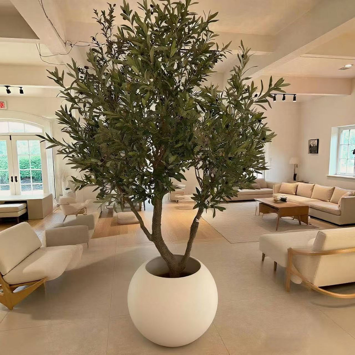 The trunk and planter of the 6.5ft Mediterranean-style artificial olive tree