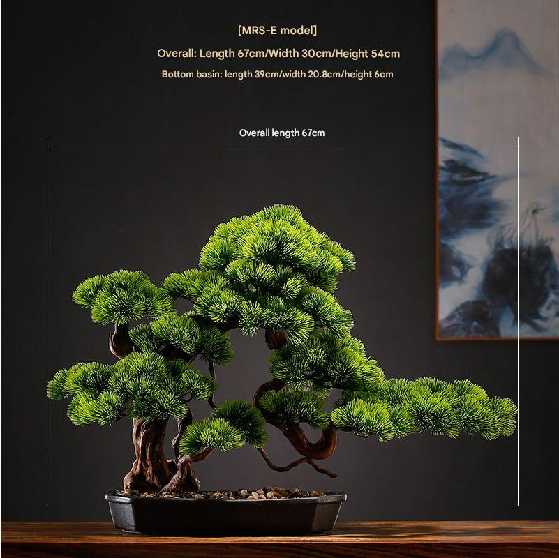 Pot and base of the artificial bonsai tree, topped with moss and gravel