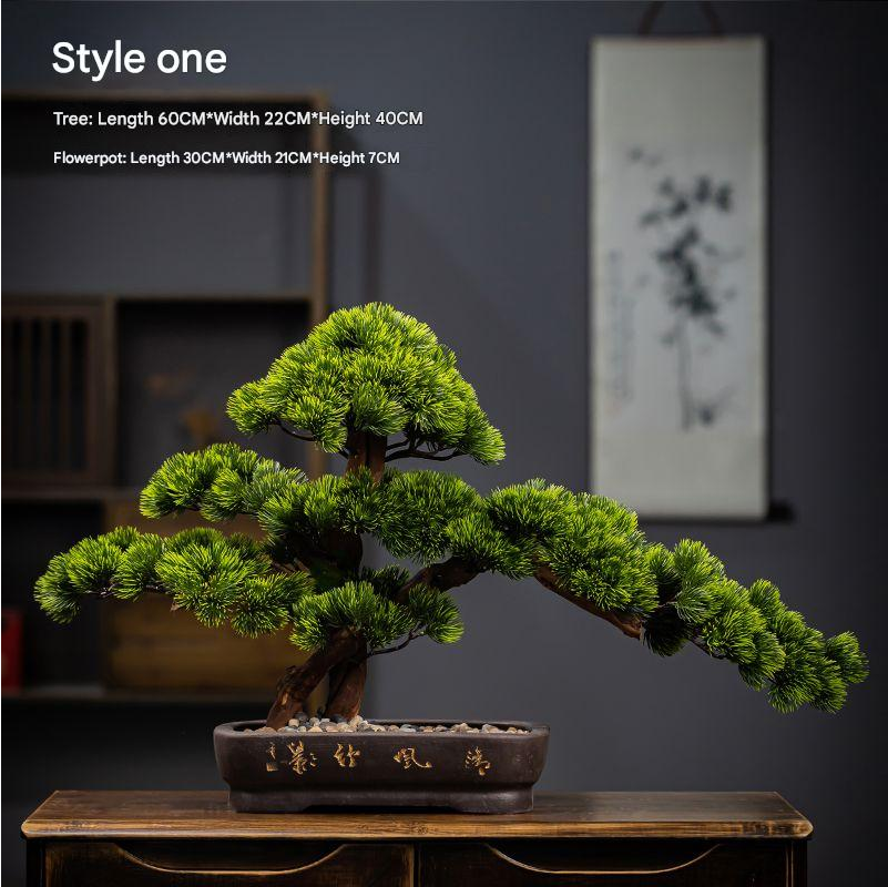 Artificial pine bonsai 3ft tall, its branches trained into flat layered green pads