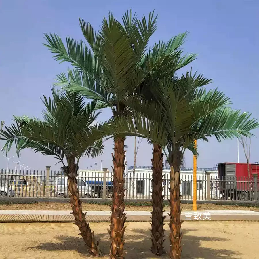 The 2m and 5m versions of the artificial palm shown together for height comparison