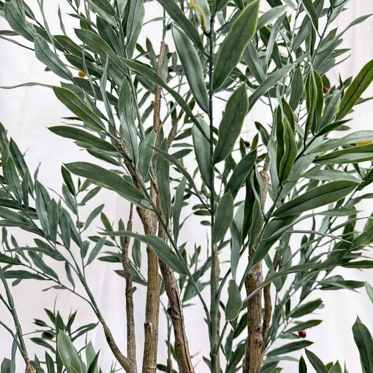 Pot and base of the faux olive tree, sized to drop into a decorative planter