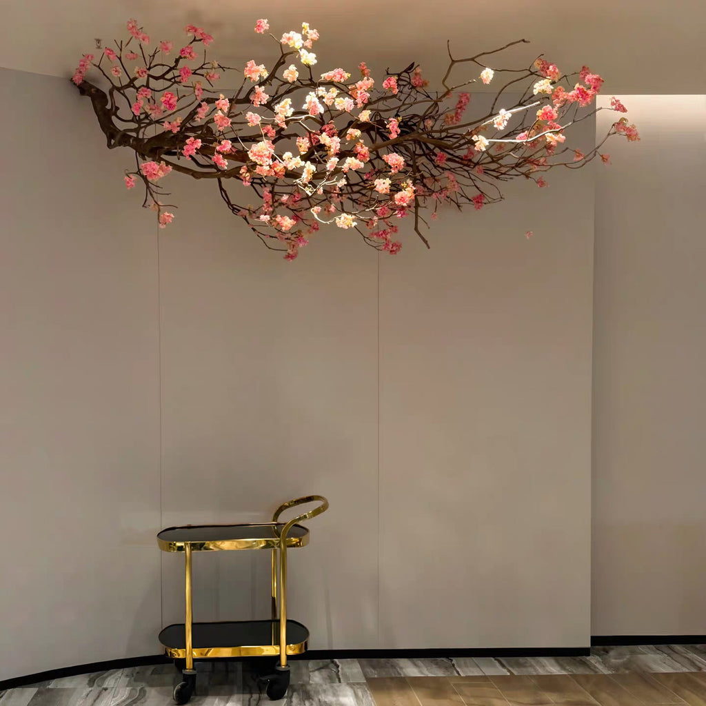 The hanging branch fixed to a wall as a floral decoration in a restaurant